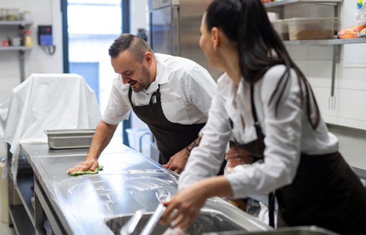 Cleaning restaurant kitchen